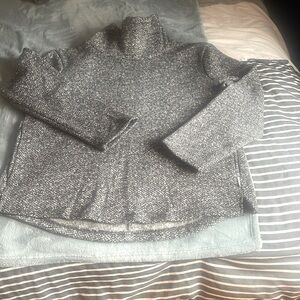 Sweater shirt black and white, warm and fuzzy inside, smooth know outside